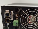 a computer power supply sitting on top of a white table