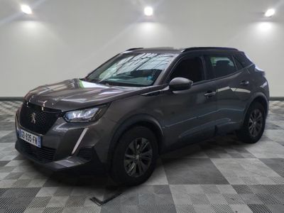 a picture of a grey suv parked in a garage