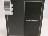 the back of a black box with a white barcode on it