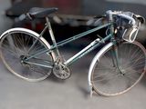 a bicycle that is parked in a garage