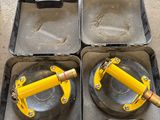 two yellow jacks are sitting in a case on the floor