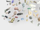 a lot of small toy animals on a white surface