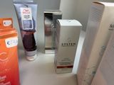 many different types of skin care products on a table