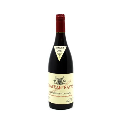 a bottle of wine that is sitting on a table