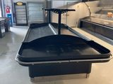 an image of a conveyor belt in a warehouse with a conveyor belt in the foreground