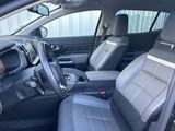 the interior of a car with black leather seats and gray trims