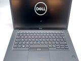the dell laptop is open and ready to be used