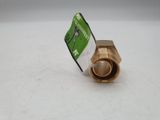 a close up of a brass fitting on a white surface