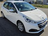 a picture of a white car parked in a parking lot