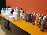 many different types of hand sanitizers on the counter