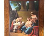 une peinture à l'huile représentant une femme tenant un bébé sur ses genoux