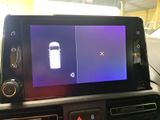 a picture of a car dashboard with a gps device on it