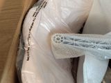 a box with a pair of shoes inside of it