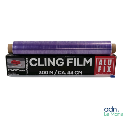 a roll of purple film sitting on top of a box