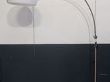 an image of a lamp that is on a stand in a room