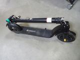 a scooter that is sitting on the floor
