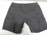men ' s grey cargo shorts on display on a table