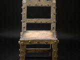an image of a chair made out of rope and wood