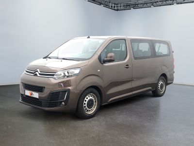 citroen van parked in a showroom with white walls