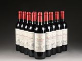 six bottles of red wine are lined up in a row