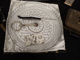 a glass plate with a key on top of it