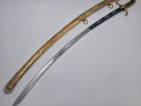 two swords, one with a gold handle and the other with a blue handle