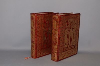 two books that are sitting side by side on a table