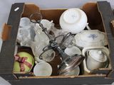 a box full of assorted items sitting on a table