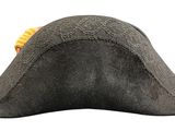 a black hat with a yellow flower on the top of it