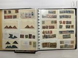 an open book with stamps on it on display