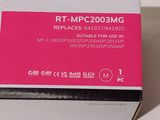 a box of pink ink sitting on a white surface