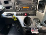 a close up of a car dashboard with a car radio