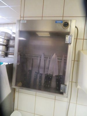 a picture of a kitchen with a lot of pots and pans