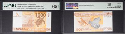 three different types of currency displayed in a display case