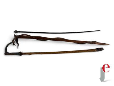 pair of two wooden swords with metal handles on a white background
