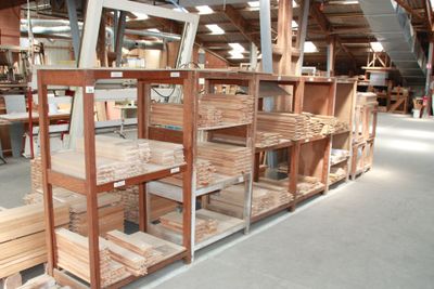 a large room filled with lots of wooden items