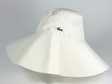 white bucket hat with a green alligator on the front
