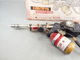 a fire extinguisor and a fire hose on a table