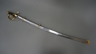 an image of a sword on display on a table