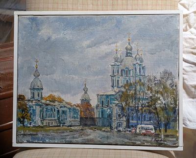 a picture of a painting of a church on a chair