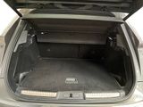 a trunk of a car with the door open