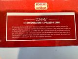 a red box with a sign on it that says caffet