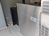 an image of a stainless steel refrigerator in a kitchen