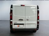 a white van that is parked in a room