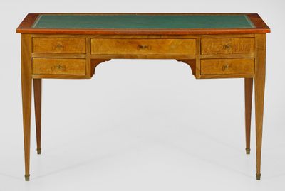 an antique writing desk with a green top and two drawers