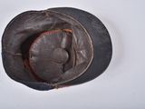 a brown hat with a brown leather band on it