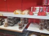a display case in a store filled with different types of food