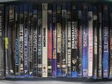 a picture of a collection of dvd ' s on a shelf