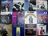 a lot of records on a table with a lot of them