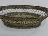 an image of a basket with a handle on a table